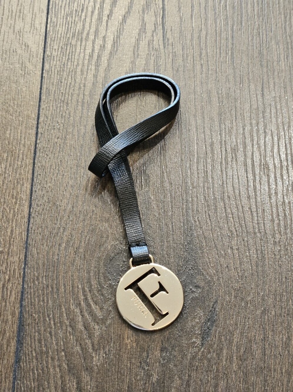 FURLA Gold Logo Medallion Black Leather Loop Bag Charm
